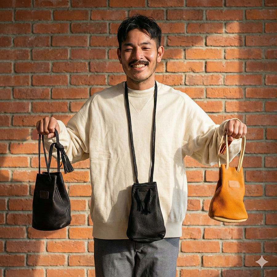 NASNGWAM (ナスングワム) / 巾着 レザー バッグ / DEARSKIN WHISKY BAG - BLACK / EM2326402 / 日本製